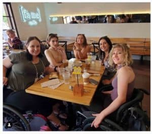 An airline-damaged wheelchair did not slow this group of friends down.