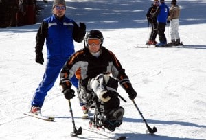 Sgt. Anthony Larson learns to ski using outriggers.