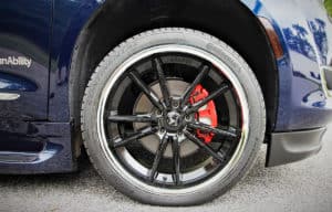 Red calipers amplify the cool factor of the customized rims.