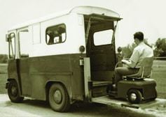 There weren’t any sleek minivan conversions available when Braun invented the first lifts. This old mail truck had to do.