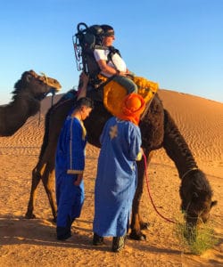 Woodard crosses “riding a camel” off his bucket list.