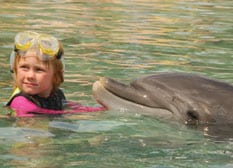 Sarah Vogel's first kiss was with Capricorn the dolphin.