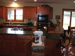 Marilyn Harms' son, a builder, designed her an accessible home with her favorite activities — such as cooking — in mind.