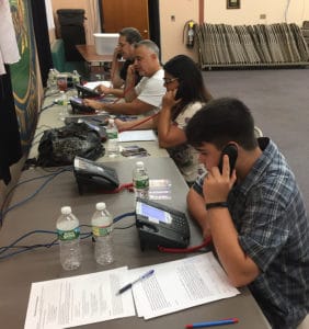 LiBassi and volunteers, including Mac, work the phone lines before the election.
