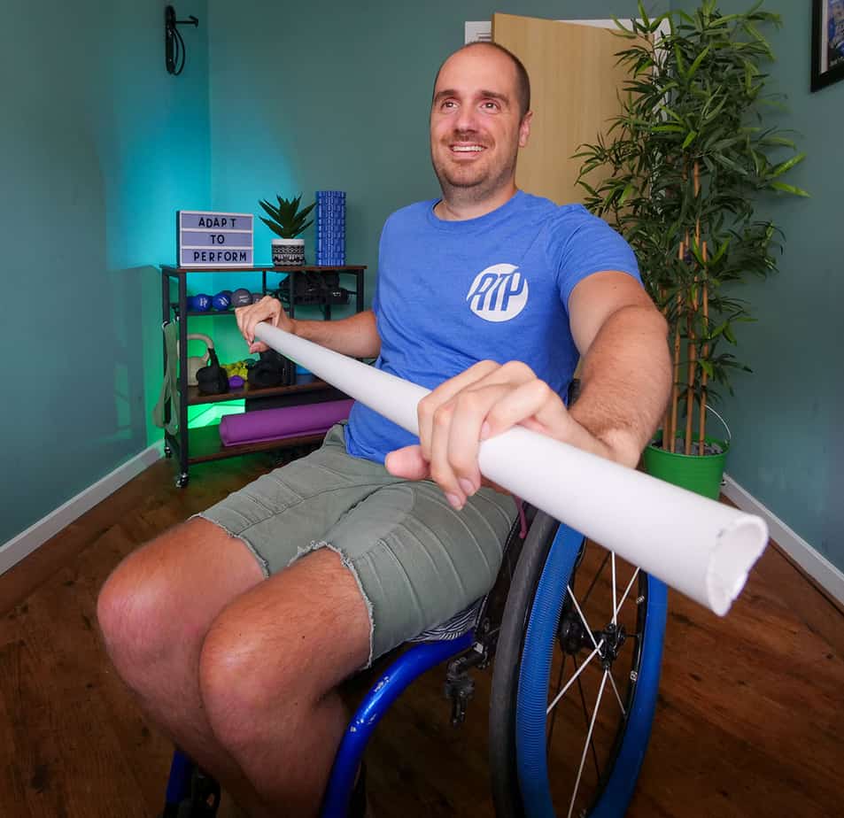 You don’t need expensive equipment to get a good workout. Here, Clark uses a broomstick.
