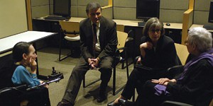 A consummate professional, Harriet McBryde Johnson meets with the panel before speaking at the U.S. Holocaust Memorial Museum for the TV series, Insights.