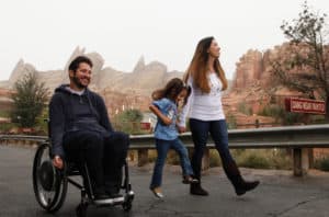 Andrew Skinner and his daughter, Betty, and wife, Kirsten, happily explore Disney’s California Adventure.