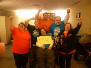 ADAPT activists celebrate the 100th hour of their sit-in.