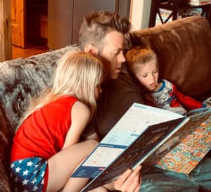 Josh Spencer shares his love of reading with his children.