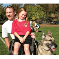 NM0411_Dimestore_img1 Soccer dad Bob Vogel, shown here with daughter, Sarah, discovered he doesn’t need a lot of money to live well.