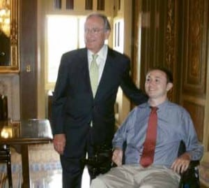 Josh Basile’s journey has so far included launching two websites for people with SCI and working on legislation with disability champion Sen. Tom Harkin (left).