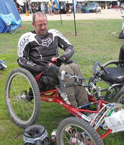 Topher Downham loves hitting the trails on his four-wheel downhill mountain bike.