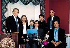 Jayne gathers with family and congressional supporters following his May 16,2001, speech in support of the Homebound Clarification Act.