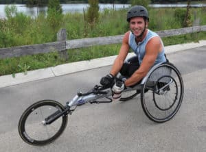 Daniel Tratt (on cycle) is excited to host NYC’s first SCI Awareness Run-Walk-Roll.
