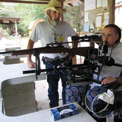 Vets_8 Petty Officer Pete Herrick practices using adaptive shooting equipment.