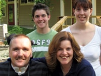 Vets_9 Pete Herrick — shown here with his wife Diana and their children at a family reunion — joined the Navy Reserve as a response to the 9/11 attacks.