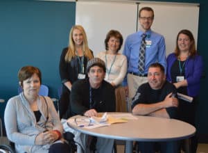 GBC peer mentors Pamela Daley, Jerry Donovan and Chris Ray (front L-R) play a key role with the Spaulding Rehab team. Standing (L-R): Caitlin Weiler, Irene Lerman, Daniel Meninger and Julie Maney.