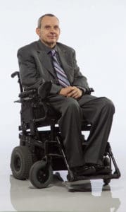 Switching to a power chair gave Phil Pangrazio more energy for work.