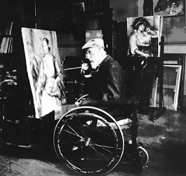 Renoir at work in his studio. His wheelchair was considered quite modern at the time.