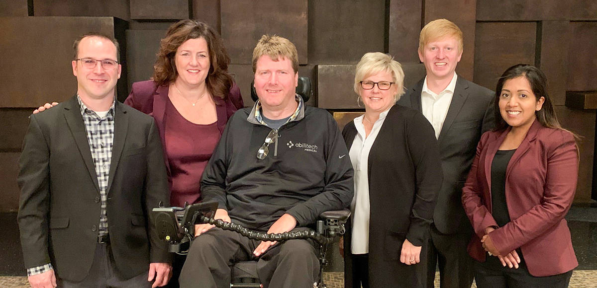Abilitech team members pose for a photo at the 2019 Minnesota Cup business competition, where their entry won first place.