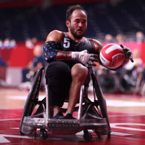 paralympic athlete Chuck Aoki in action playing wheelchair rugby