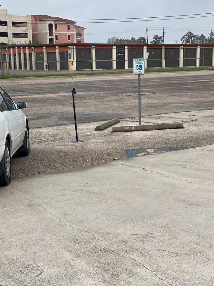 Hard to see reserved parking sign