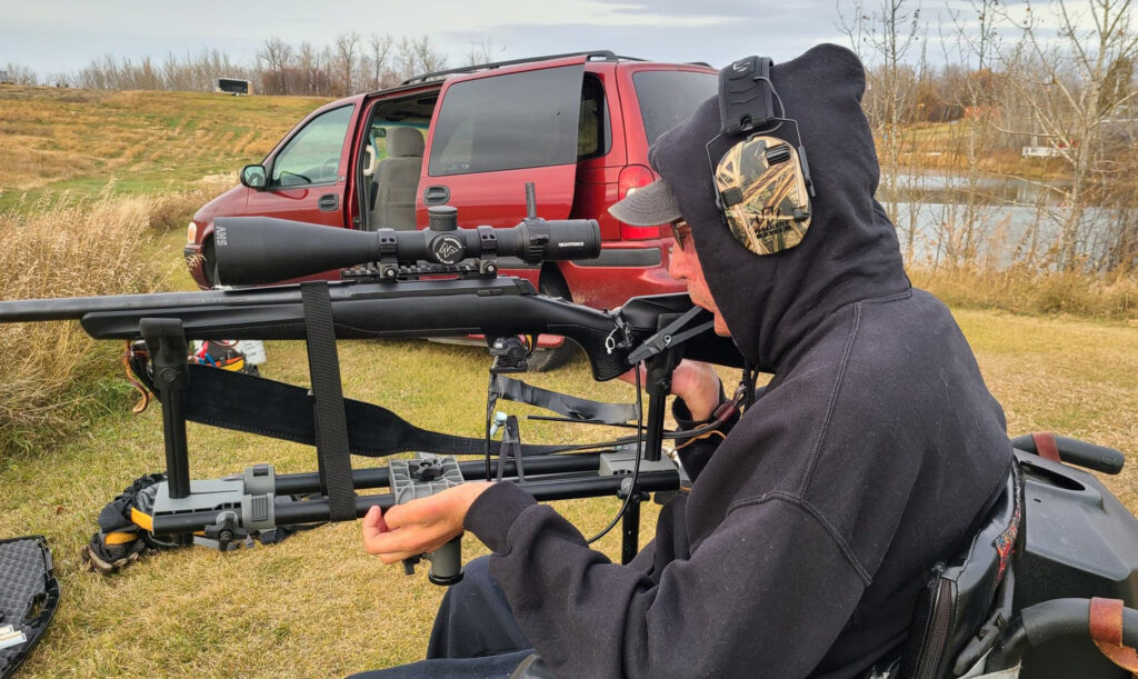 treepod gun rest mounted to a powerchair