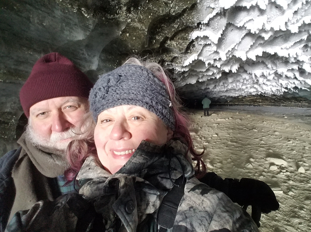 handPorreca poses for a selfie with husband Tony in an ice cave.