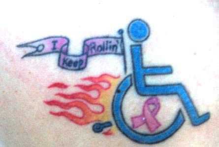 Colorful tattoo of the wheelchair symbol flames coming off the wheel and a sign that reads "I keep rolling"  and a pink cancer ribbon in the wheel hub