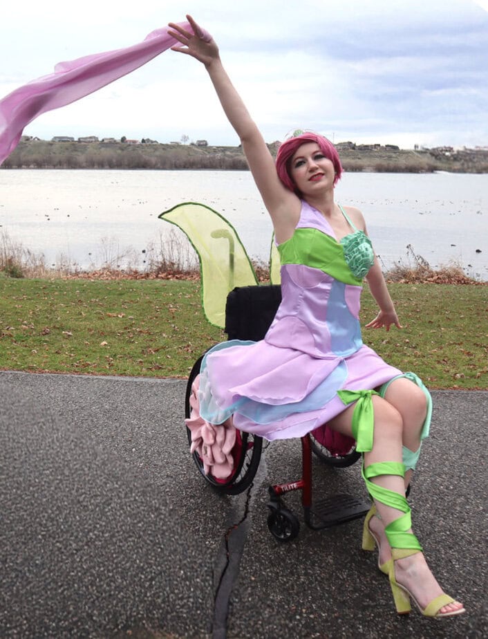 Woman in wheelchair wearing Tecna Harmonix costume