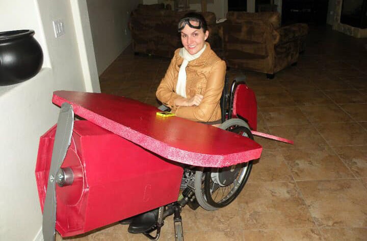 Halloween costume of Small aircraft prototype with a woman in a wheelchair