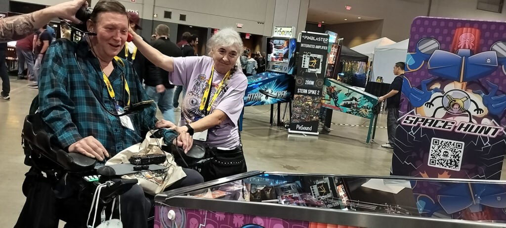 Innovative gaming arcade at New Mobility expo, featuring Space Hunt immersive experience.