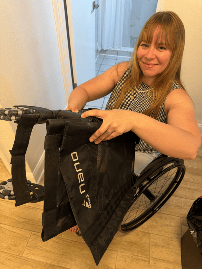 woman in wheelchair showing the nano folded